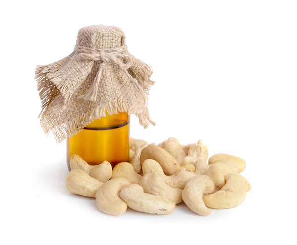 Cashew oil with nuts — Stock Photo, Image