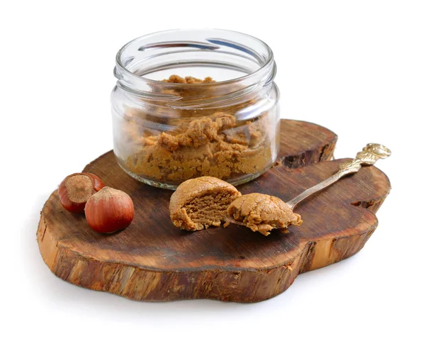 Homemade praline in the glass jar. With nuts. — Stock Photo, Image