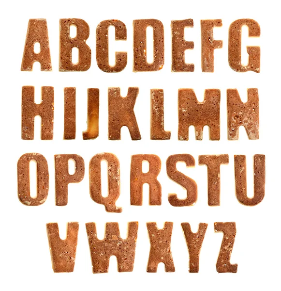 Alfabeto caseiro de letras de biscoito no fundo branco. Isolados — Fotografia de Stock