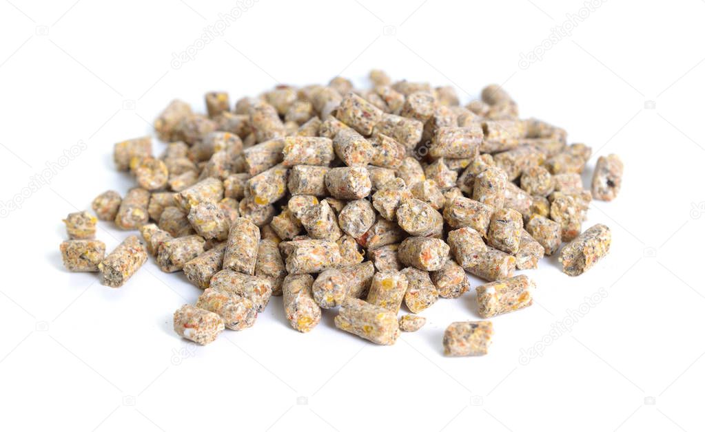 A pelleted ration designed for chicken. Isolated on white backgr