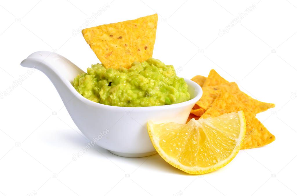 Guacamole with nachos. Isolated on white background