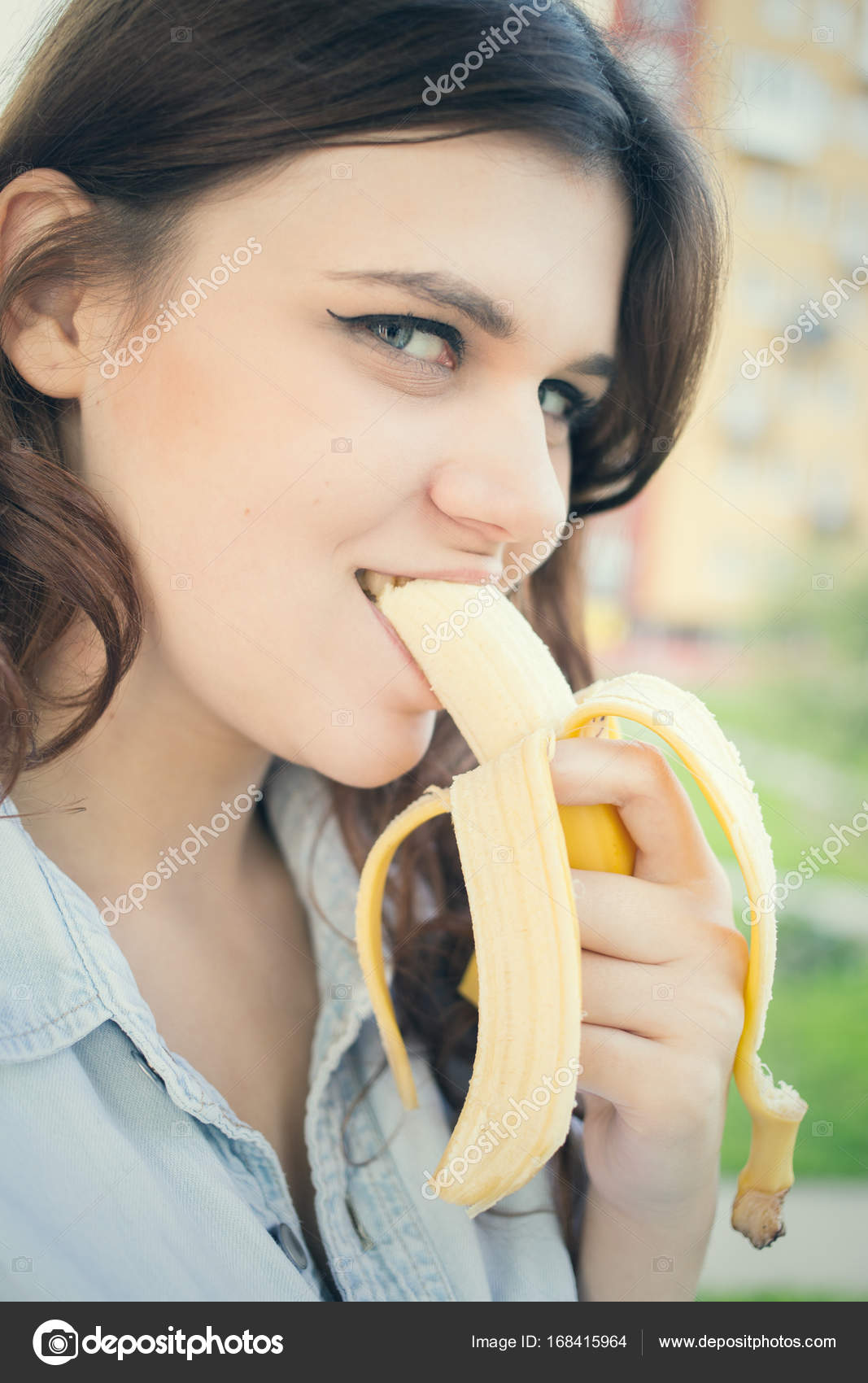 Woman eats banana — Stock Photo © lekcej 168415964