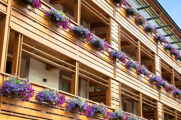 Flowers on Chalet balcony — Stock Photo, Image