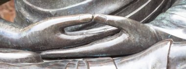 Detail of Buddha statue with Dhyana hand position, the gesture o clipart