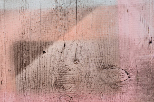 Painted pink panel wood texture.
