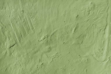 Engebeli yeşil boyalı duvar yüzey arka plan yıpranmış
