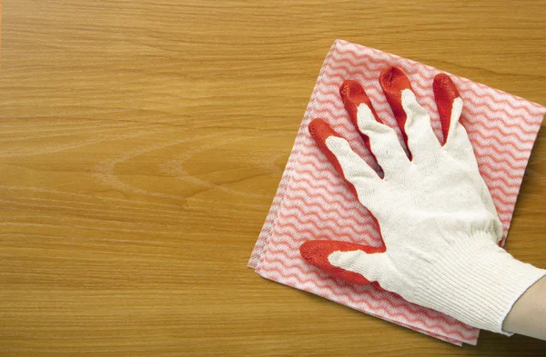 Hand in it is white to a red glove — Stock Photo, Image