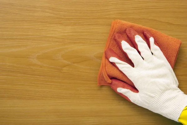 Hand in Hand ist weiß zu einem roten Handschuh — Stockfoto