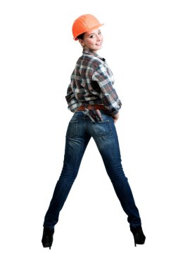 Güzel, sarışın, kotlu, kotlu, cep aletli.