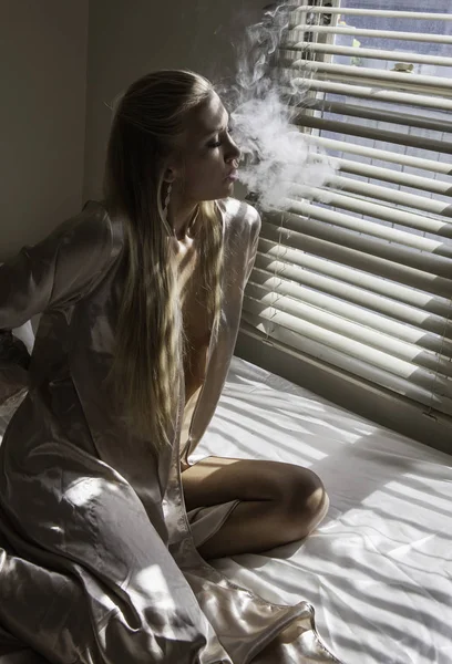 Blond girl in her bedroom — Stock Photo, Image