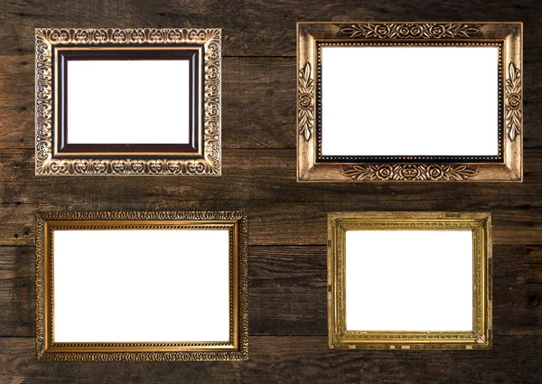 Old Gold Picture Frames on wooden wall