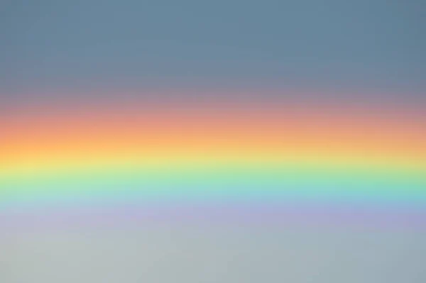 Rainbow phenomenon after summer storm or rain on sky