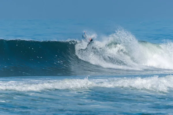 Bodyboarder i aktion - Stock-foto