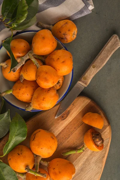 Loquats on kitchen counter — Stock Photo, Image