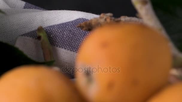 Loquats on kitchen counter — Stock Video