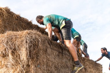 Saman osbtacle üstesinden sporcular