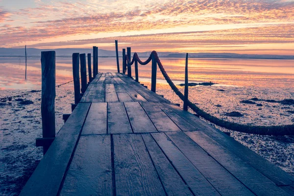 Sunrise of a wooden pier — Stock Photo, Image