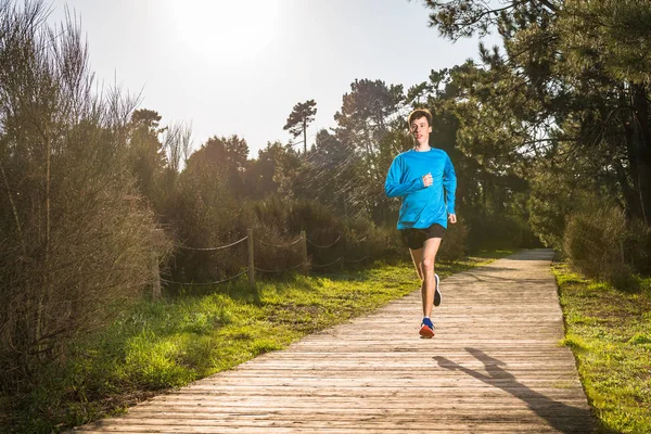 Young man running — Stock Photo, Image