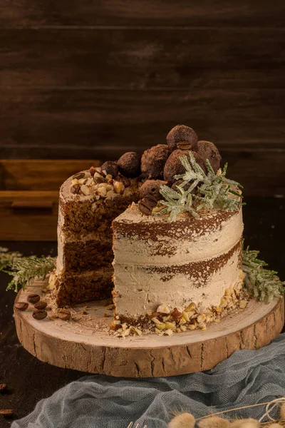 Slice of delicious naked coffee and hazelnuts cake — Stock Photo, Image