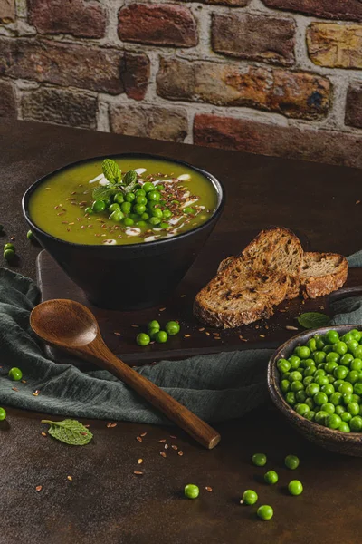 Green Pea Soup Linseed Pumpkin Sunflower Seeds Rustic Kitchen Countertop — Stock Photo, Image