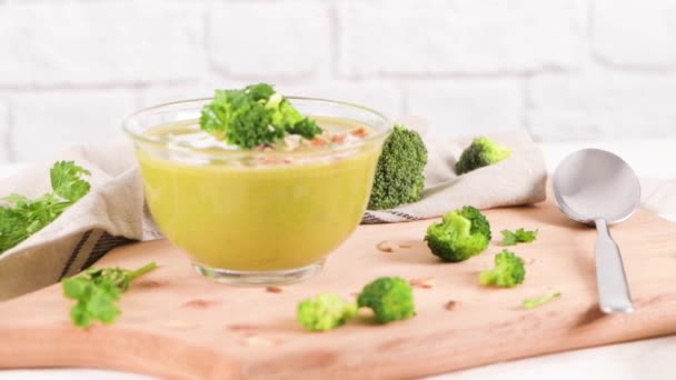 Broccoli Soup Glass Bowl Kitchen Countertop Slices Stems — Stock Video