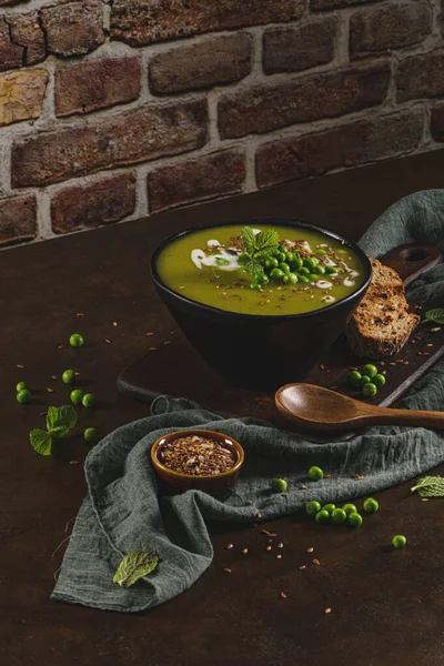 Green Pea Soup Linseed Pumpkin Sunflower Seeds Rustic Kitchen Countertop — Stock Photo, Image