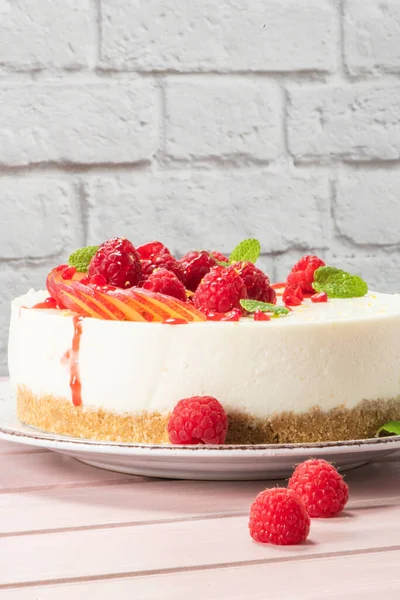 Cheesecake Fresh Raspberries Plums Mint Leaves — Stock Photo, Image