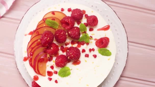 Cheesecake Fresh Raspberries Plums Mint Leaves — Stock Video