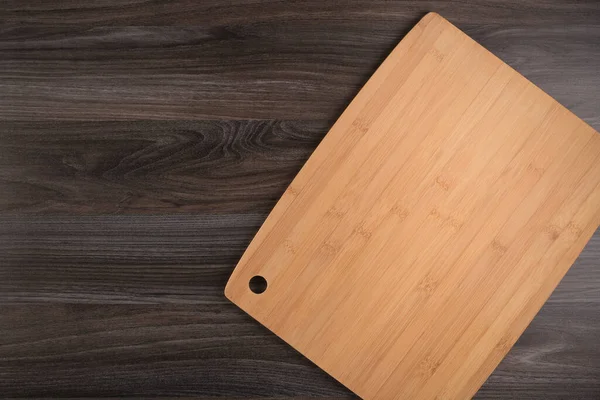 Top View Wooden Cutting Board Old Dark Wood Countertop — Stock Photo, Image