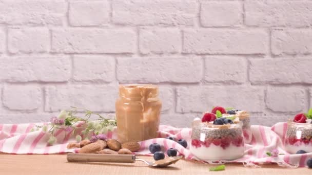 Chia Pudding Oat Berries Glass Jar Rustic Background — Stock Video