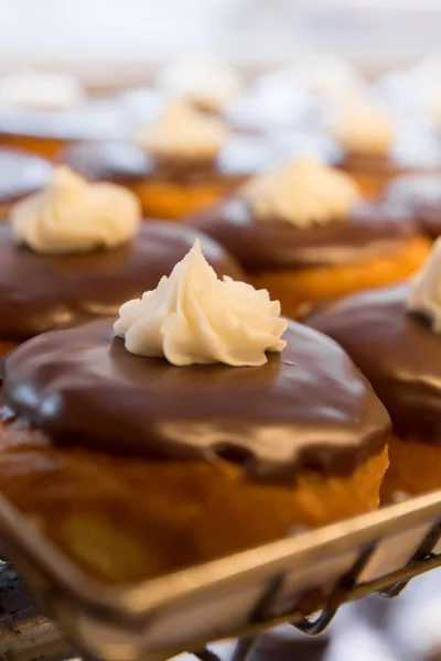 Creme filled chocolate donuts — Stock Photo, Image
