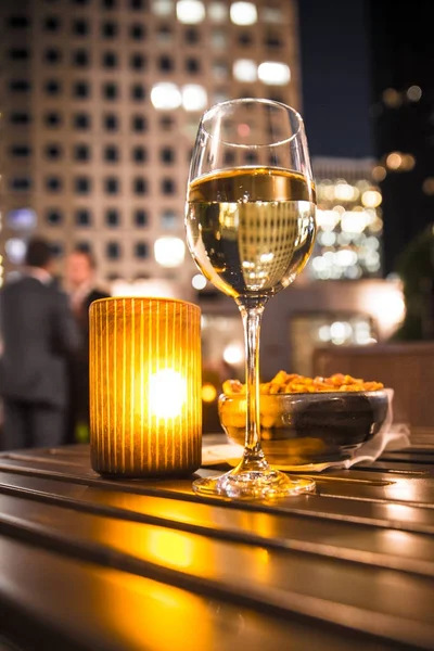 Glass White Wine Candle Evening View City Buildings — Stock Photo, Image