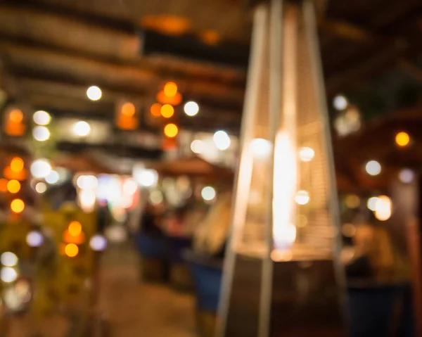 Desfocado Restaurante Borrão Com Luz Aquecedor Gás — Fotografia de Stock