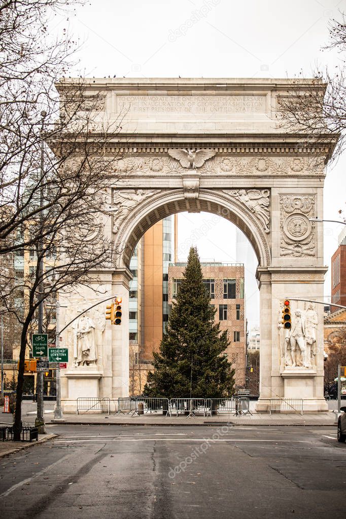 Washington Square Park, Greenwich Village, New York City during the Christmas holiday season with Christmas Tree under historic arch