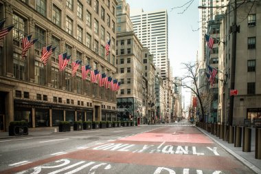 NEW YORK CITY, USA - APRIL 18, 2020:  Empty streets in midtown Manhattan, in New York City along Fifth Avenue during the global Covid-19 Coronavirus Crisis.  clipart
