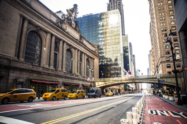 NEW YORK CITY - APRIL 19, 2020: View of empty street at Grand Central Terminal in Manhattan during the Covid-19 Coronavirus pandemic lockdown.