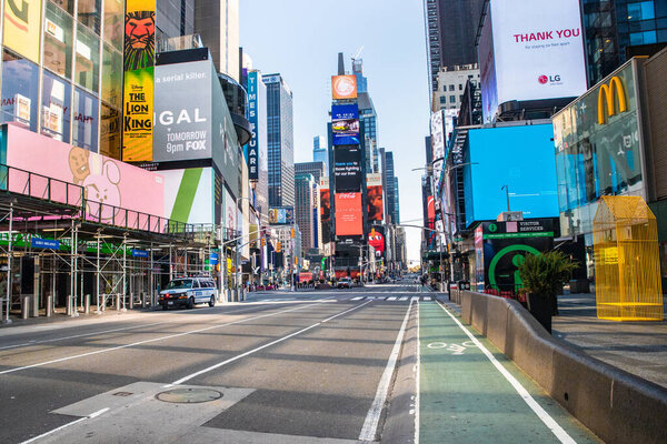 NEW YORK CITY - APRIL 19, 2020:  View of empty street in Times Square, NYC in Manhattan during the Covid-19 Coronavirus pandemic lockdown. 