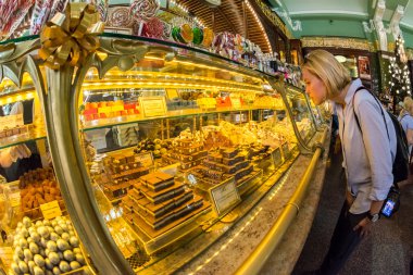 Interior of Yeliseev's Food Hall. Yeliseyev Grocery Store constr clipart