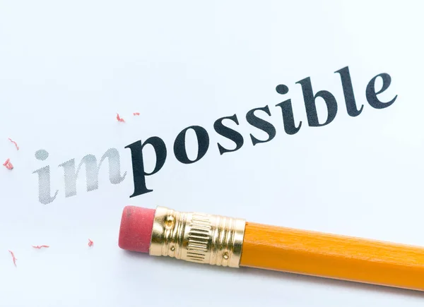 Palavra "impossível" e lápis com borracha close-up — Fotografia de Stock
