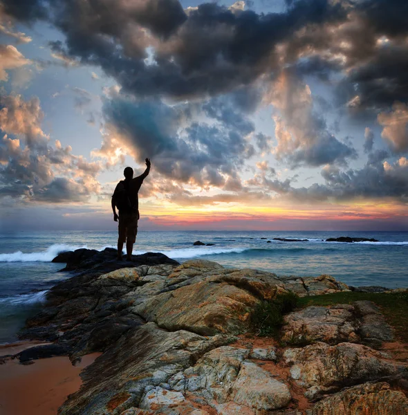 Silhouette of tourist and a beautiful landscape — Stock Photo, Image