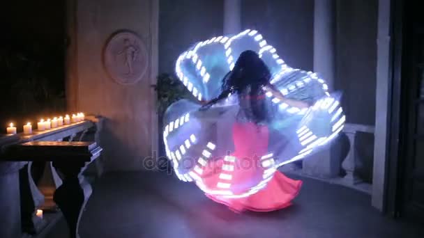 Bellydancer with led light butterfly — Stock Video