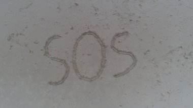 Üstten Görünüm fotoğraf tropik sahilde kum yazılmış sos
