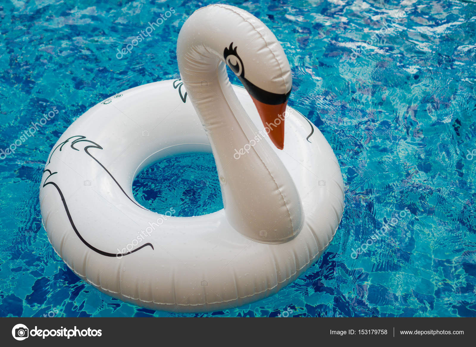 Inflatable white swan in the pool — Stock Photo © nelka7812 #153179758