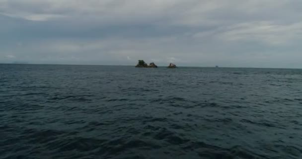 Aerial view of rocks in the sea — Stock Video