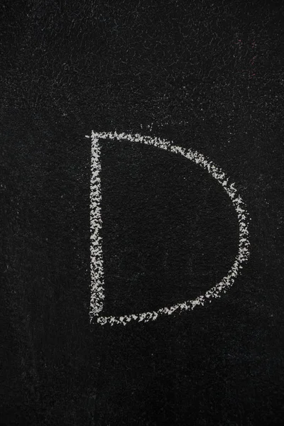 Letter D on black chalkboard — Stock Photo, Image