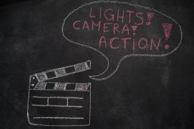 Film tokmağı ile kara tahta üzerinde konuşma balonu