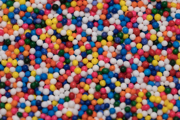 Colorido polvilha fundo de açúcar — Fotografia de Stock