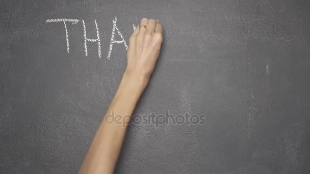 Hand writing "THANK YOU FOR YOUR ATTENTION" on black chalkboard — Stock Video