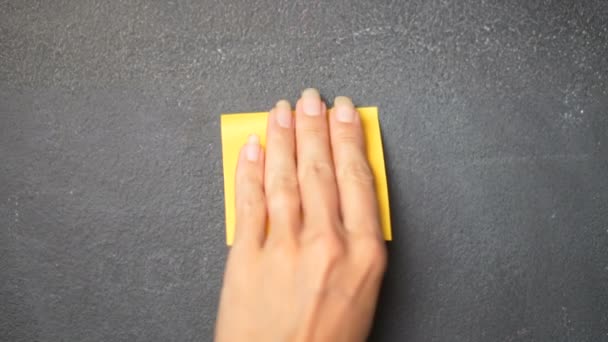 Sticky Note Blackboard Closeup Woman Hand Sticking Note Letter Blackboard — стоковое видео