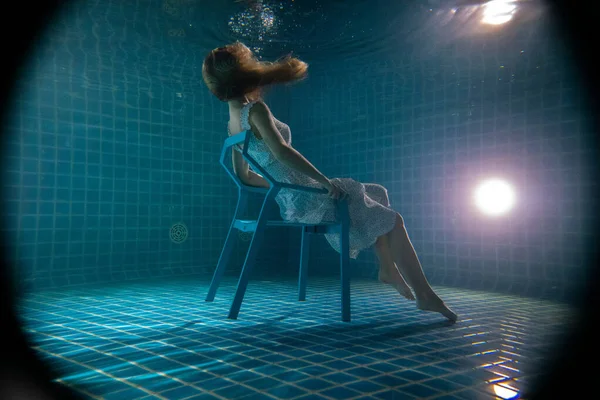 Beautiful Woman Long Red Hair Posing Underwater Chair White Dress — Stock Photo, Image